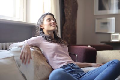 woman relaxing on couch